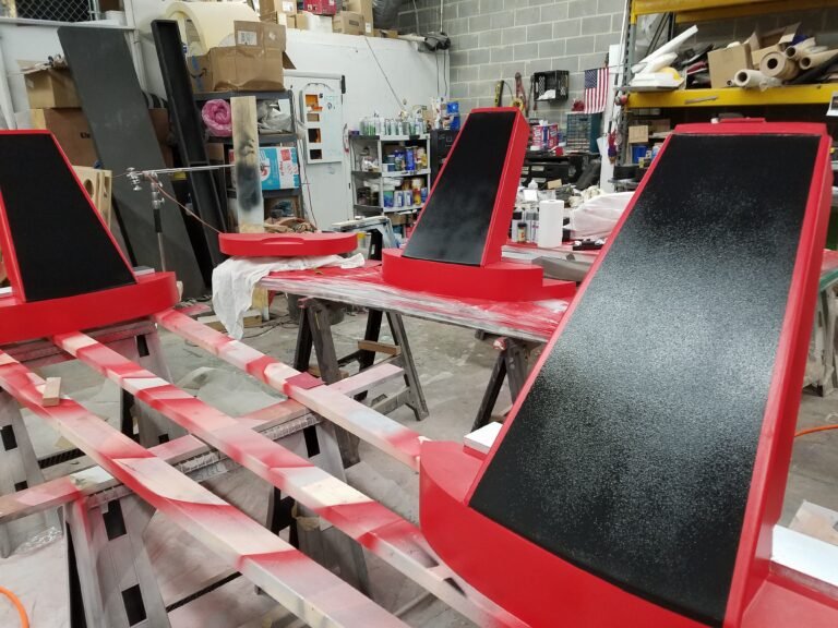 Red scenic panels being finished in the DC Scenics workshop
