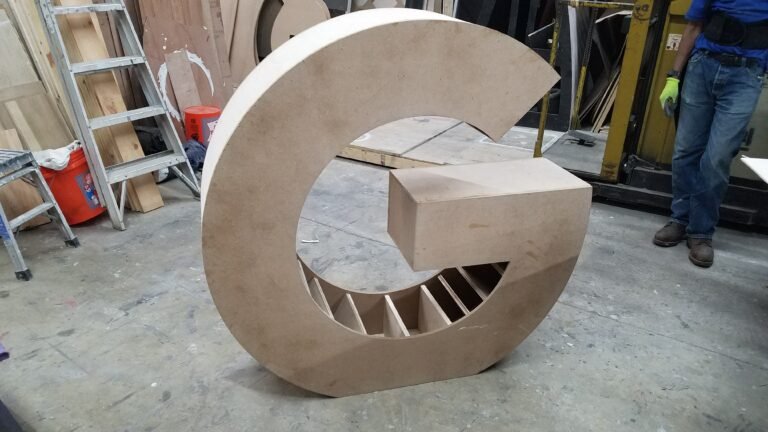 Giant letter frame being fabricated from CNC-cut ribs