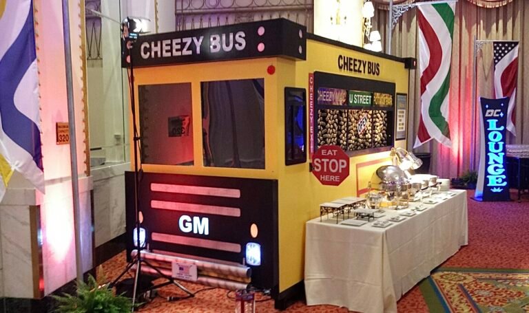 Life-size food truck facade for a food station