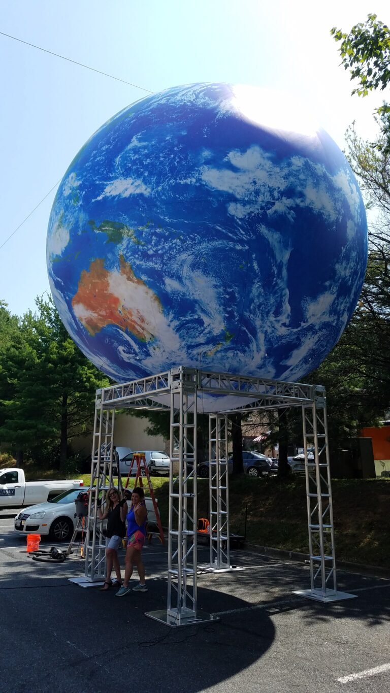 Oversized earth globe prop on a stand