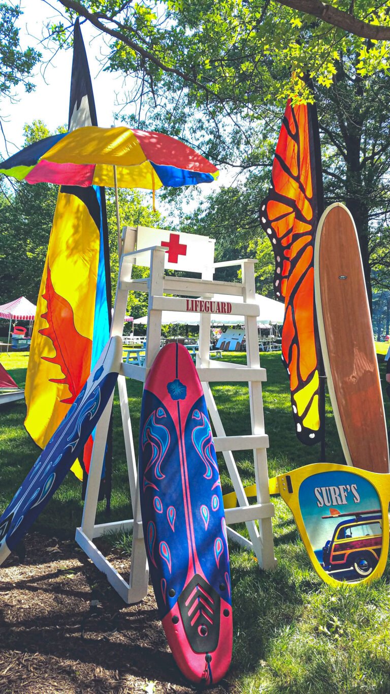 Lifeguard stand and surfboards for a beach theme