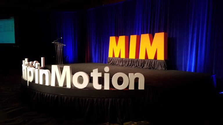 Leadership event stage with gold letters