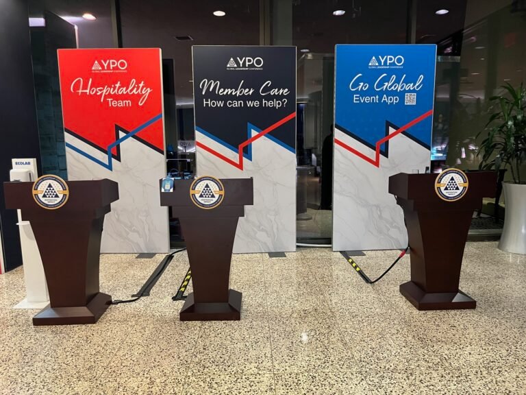 Event space being planned with branded lecterns and banners