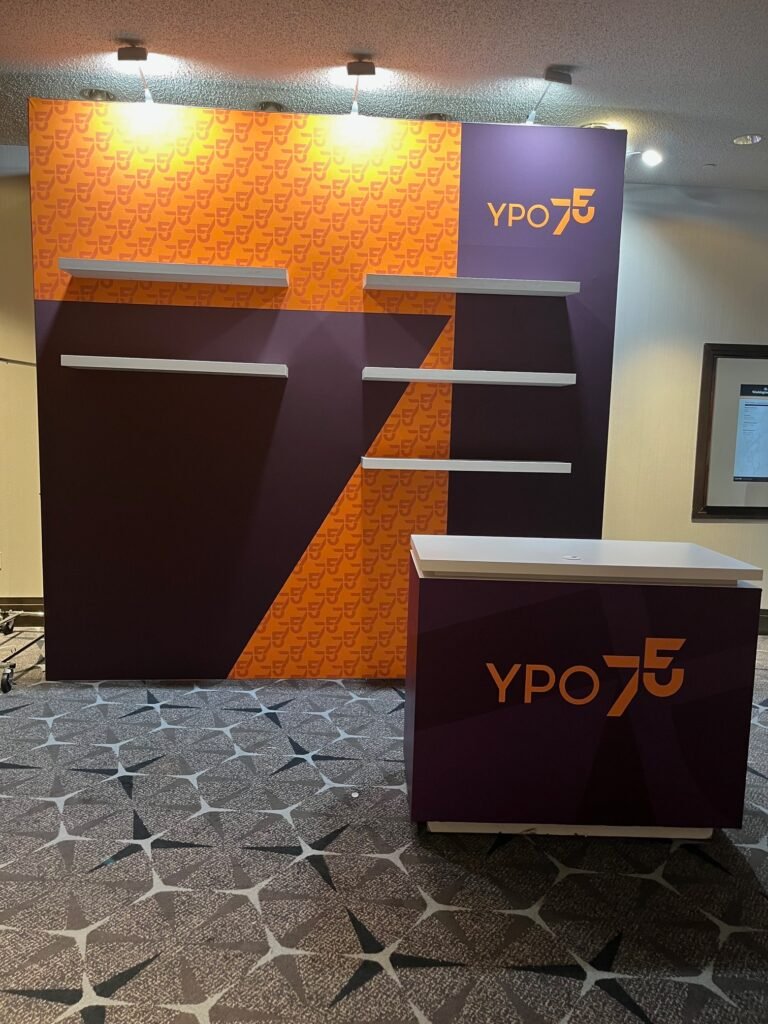 Crew setting up a branded event environment