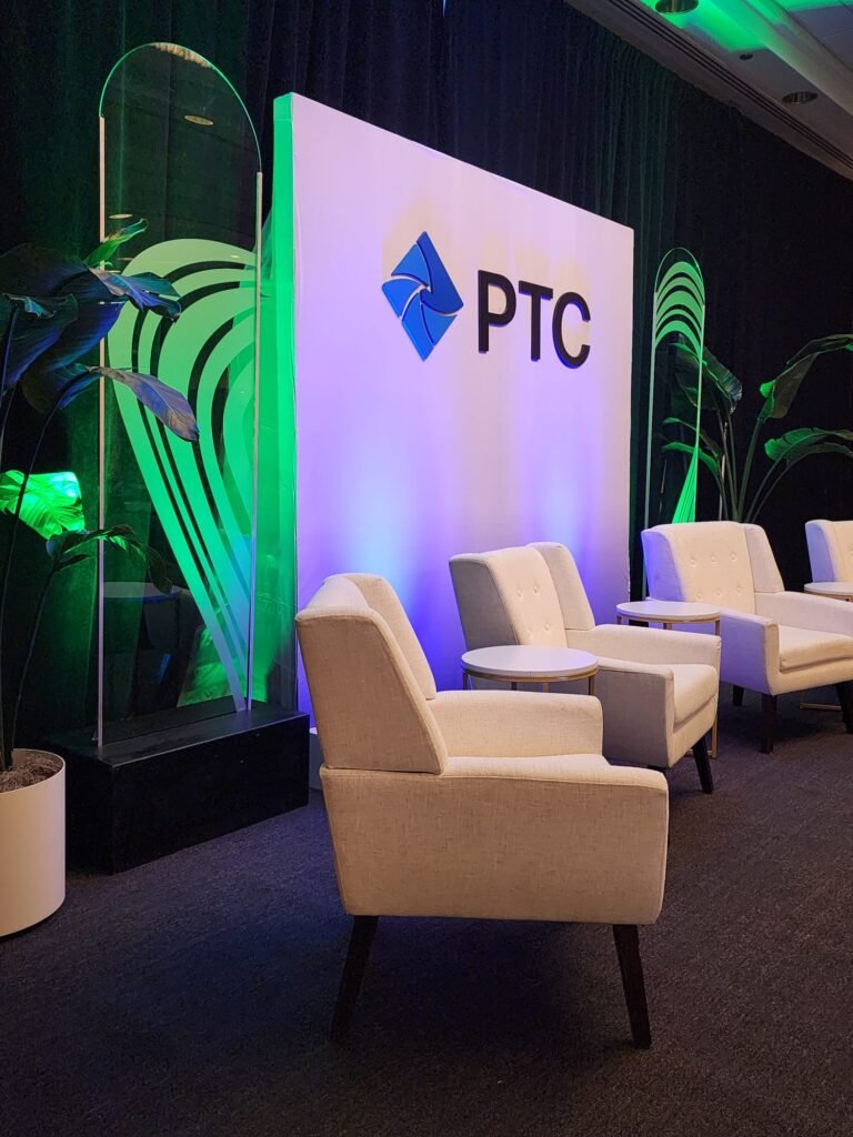 Branded lounge stage with greenery