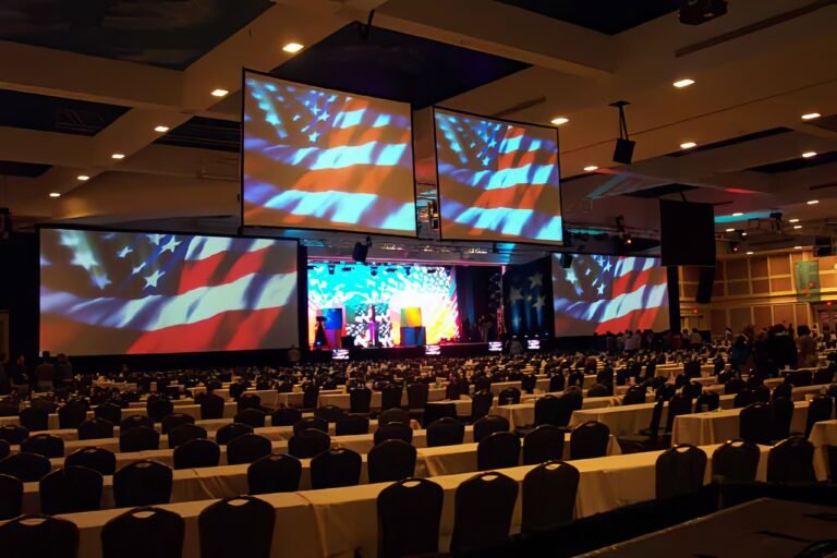 General session stage with multiple screens